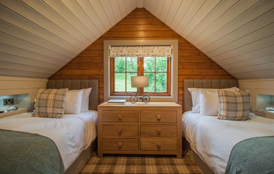 Twin bedroom with two full size single beds