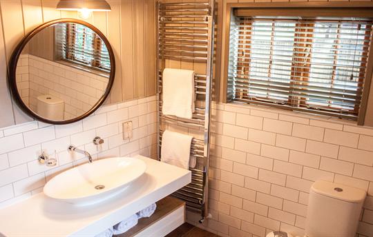 Bathroom with shower over bath