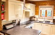 Fully fitted kitchen with wine fridge