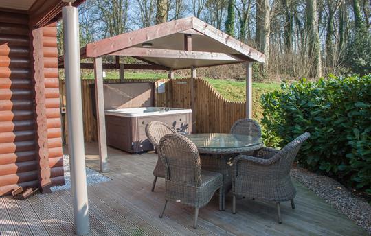 Covered hot tub and dining on your private decking