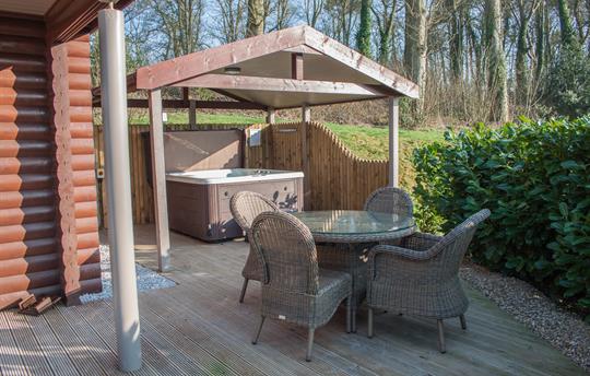 Covered hot tub and dining on your private decking