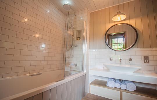 Bathroom with shower over bath
