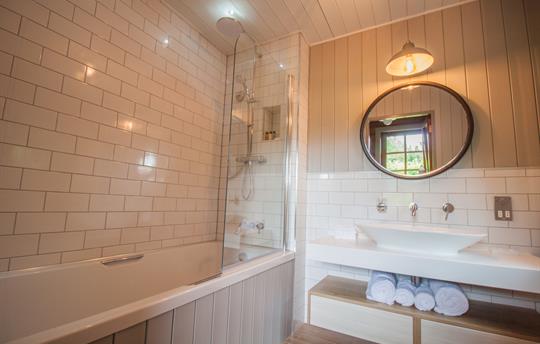 Bathroom with shower over bath