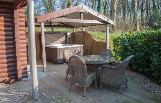 Covered hot tub and dining on your private decking