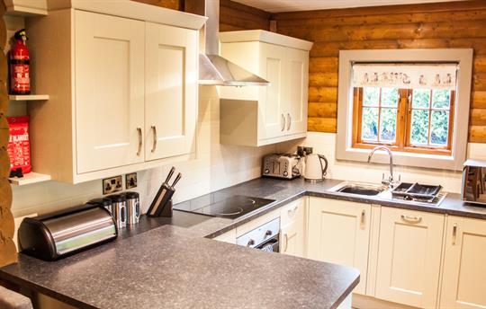 Fully fitted kitchen with wine fridge