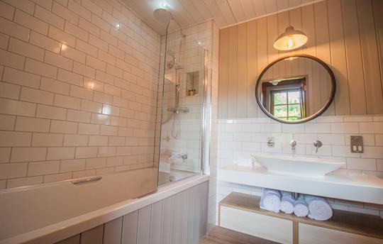 Bathroom with shower over bath