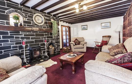 Lounge with multi-fuel stove