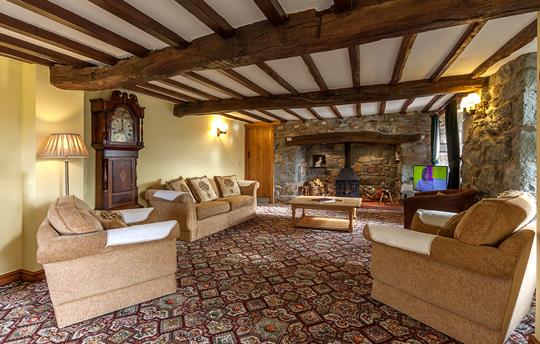 Spacious lounge with lots of character 