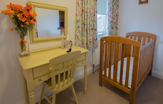 The Farmhouse family bedroom with cot space