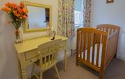 The Farmhouse family bedroom with cot space