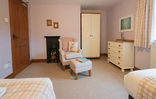 The Farmhouse twin bedroom sitting area