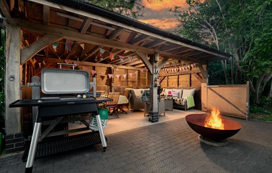 BBQ and outdoor seating area