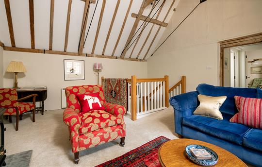 Part of living room with writing table