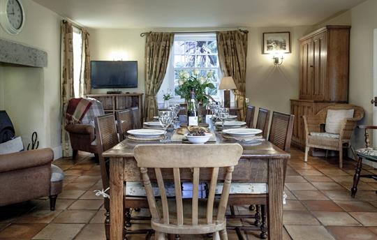 Farmhouse open plan kitchen dining w/ woodburner