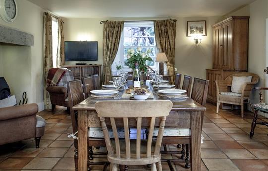 Farmhouse open plan kitchen dining w/ woodburner