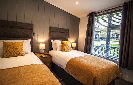 Twin bedroom with two full size single beds