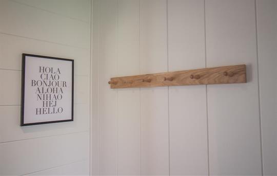 Welcome porch with coat rack and seating