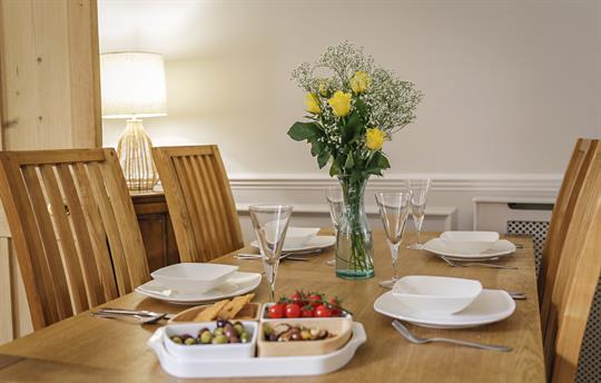 Dining table, upto five place settings