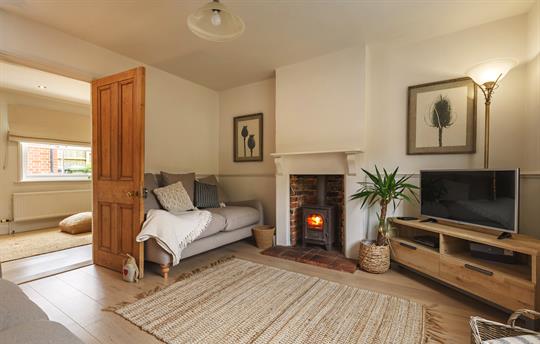 Lounge with cosy woodburning stove