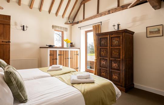 Super-king bedroom opening to garden