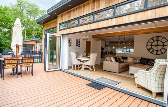 Large bifold doors to a private decking