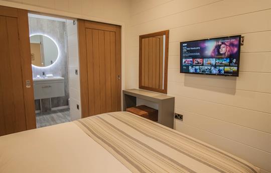 Smart TV and dressing area plus ensuite