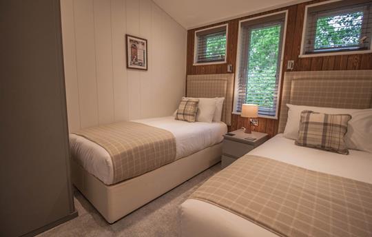 Twin bedroom with two full size single beds