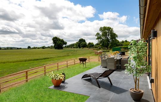 Garden patio with dining and relaxation chairs