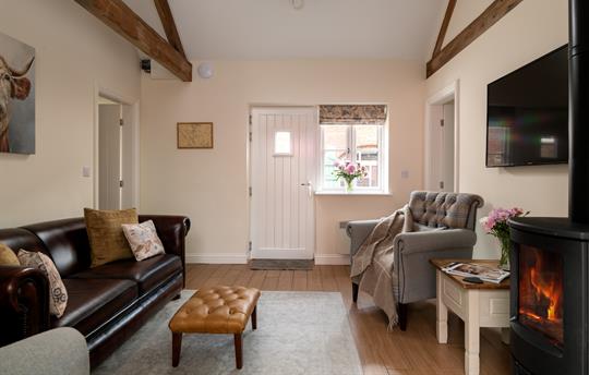 Living room with cosy log burner