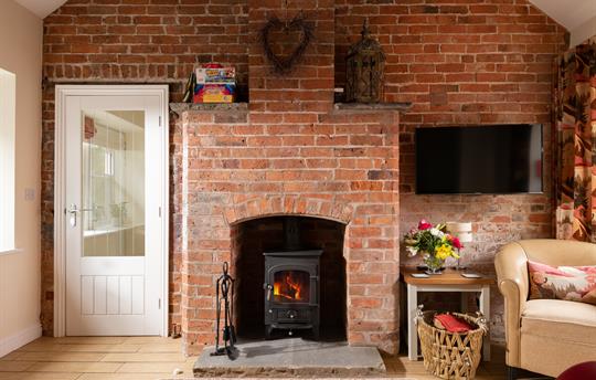 Living room with cosy log burner