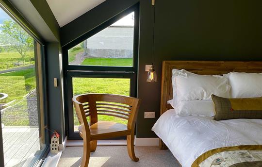 A lovely warm, sunny and bright main bedroom