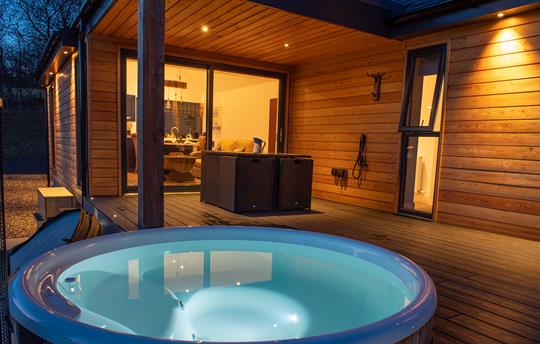 Integrated deck hot tub