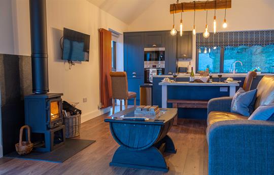 Lounge - wood-fired stove and bespoke furniture