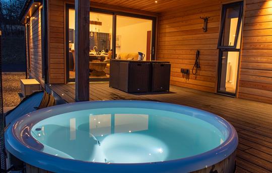 Integrated deck hot tub