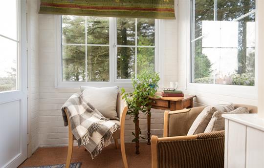 The porch is a sun trap with its bay window 