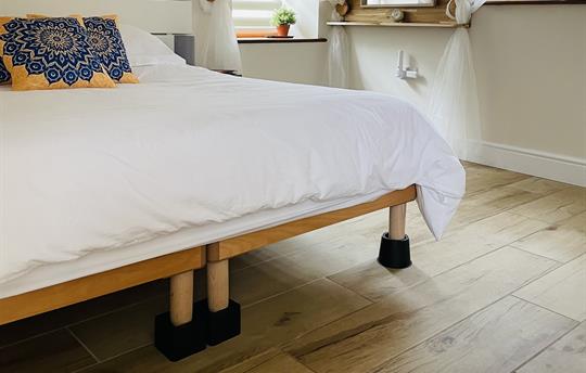 The master bedroom with raisers being used