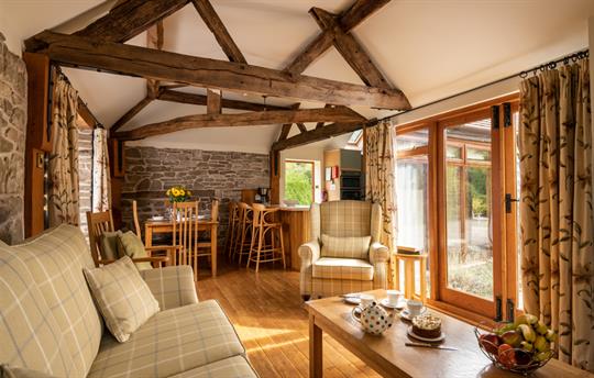 Elegant oak-beamed lounge with Smart TV