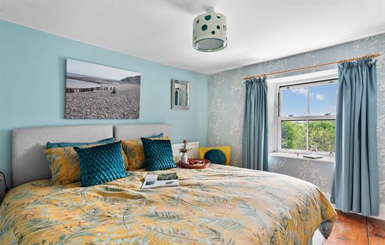 Relaxing 2nd bedroom (shown as super king)