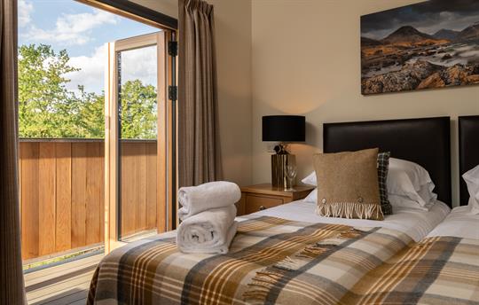 Woodland view from Bedroom 5 shared balcony