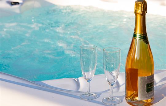 Bubbling hot tub with fizz in the garden