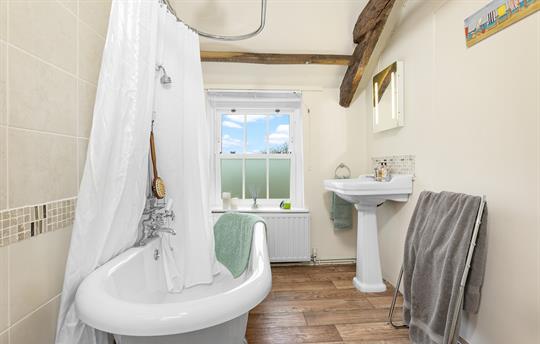 Bathroom with fabulous roll-top bath