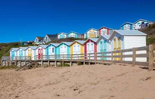 Enjoy sandy beaches & colourful beach huts at Bude