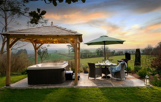 Linhay hot tub and furnished terrace with a view