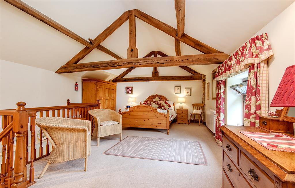 Wye Cottage Schlafzimmer mit Holzbalken