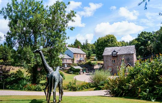 The Mill and Main House with Giraffes
