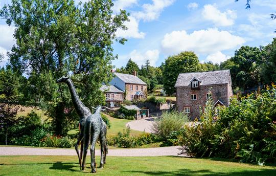 The Mill and Main House with Giraffes