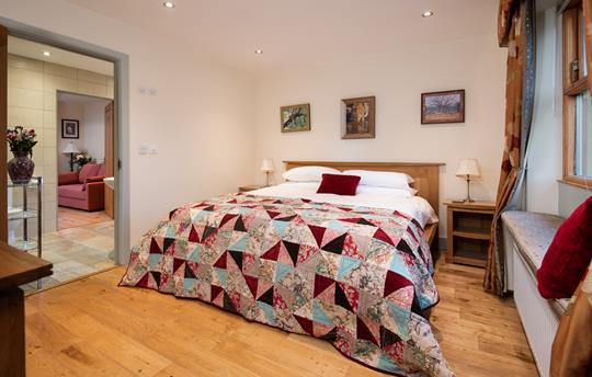 Superking bedroom and luxury ensuite at Gate Lodge
