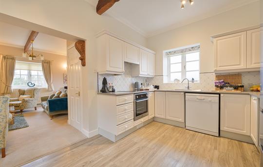 Grosvenor full kitchen leading to living room