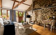 Wagon's oh-so-cosy living room with woodburner