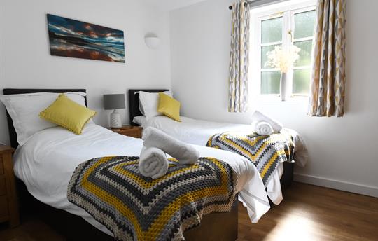 Bedroom 2, zip and link bed made up as two singles